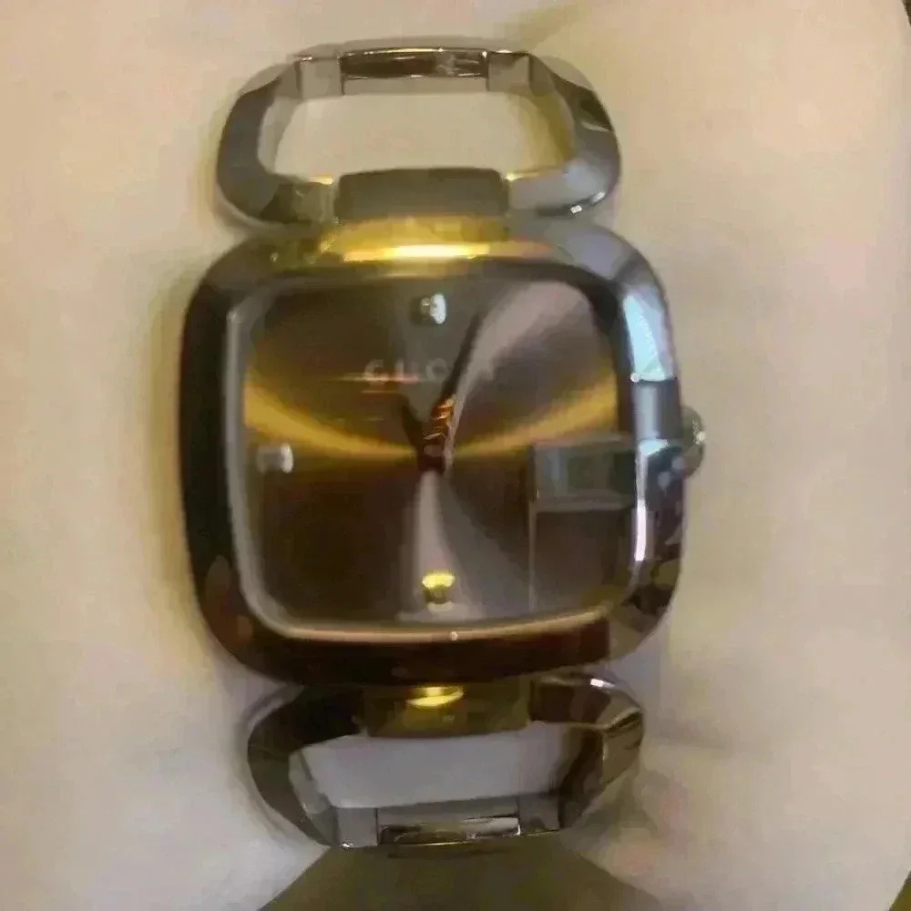 Gucci G watch Silver with Dark Bronze Face With Diamonds.